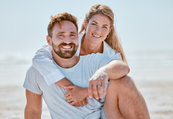 Love, couple and hug at beach on vacation, holiday or summer trip. Portrait, romance or care of man and woman hugging, cuddle or embrace and relaxing, having fun or enjoying time on seashore outdoors