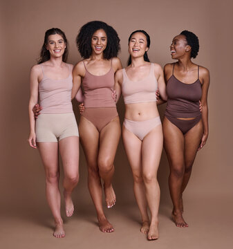 Diversity, woman and happy portrait in underwear for body motivation, beauty support and friendship collaboration. Interracial models, luxury skincare wellness and body positive happiness in studio