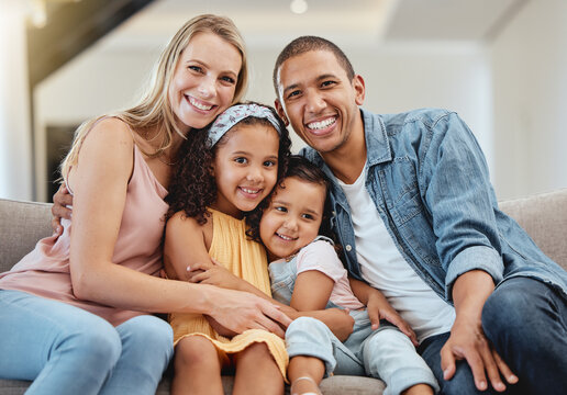 Love, Diversity And Portrait Of Happy Family Hug In Rent House Living Room, Bonding And Enjoy Quality Time Together. Happiness, Child Support Care And Children With Mother, Father Or Parents On Sofa