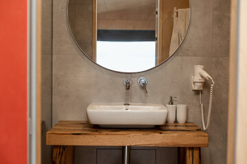 Sink with faucet and mirror, bathroom design