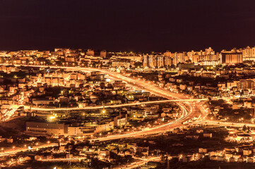 Fototapeta premium The city of Split, Croatia, Europe, panorama at night, traffic, city lights, road at night