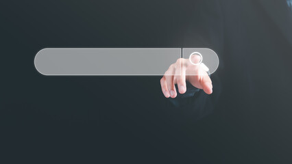 Male hand pointing to search icon Shows a search for what he's interested in,Search Technology SEO ,networking of websites with keywords,Finding results through online big data globally