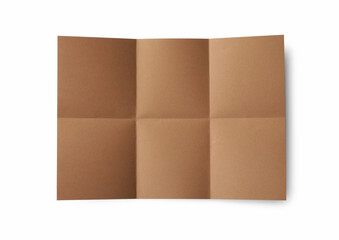 Folded kraft paper sheet isolated on white, top view