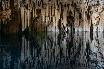 Cenote cave lake, Chichen Itza, Mexico. Cenote Zapote. Natural sinkhole pond with crystal clear water.