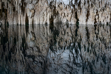 Cenote cave lake, Chichen Itza, Mexico. Cenote Zapote. Natural sinkhole pond with crystal clear water.