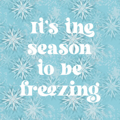It s the season to be freezing text on blue background with stylized snowflakes illustration