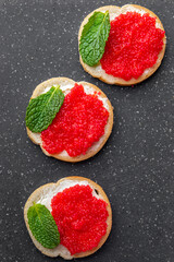 red caviar sandwich appetizer or antipasti seafood fresh healthy meal food snack on the table copy space food background rustic top view