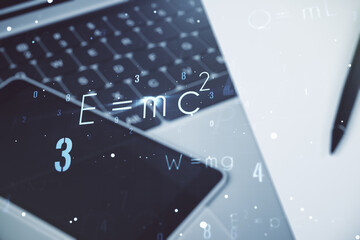 Creative scientific formula illustration on modern computer background, science and research concept. Multiexposure