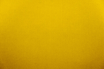 Yellow orange brown abstract background. Mustard color. Fabric surface background with space for design. Template. Empty. Halloween, autumn, Thanksgiving, Mother's day.