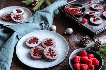 Christmas cocoa linzer cookies with raspberry jam