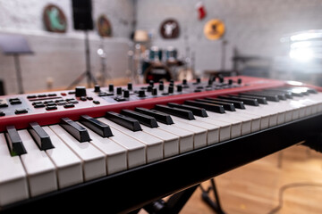 Close-u? of modern synthesizer, midi keyboard. Professional musical instrument for recording studio