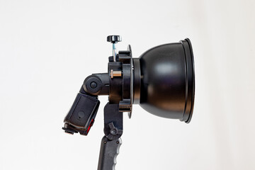 A reflector for photographing complete with a flash on a white background