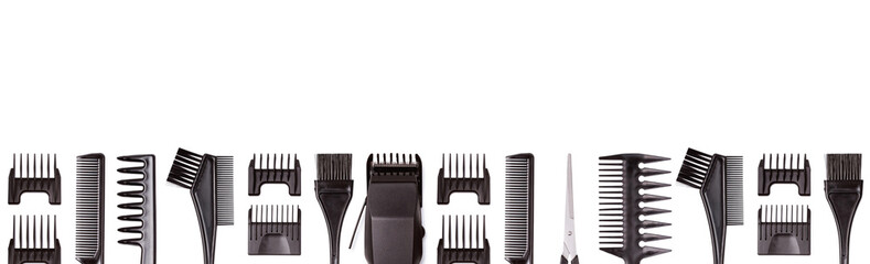 Professional hair clipper with set of nozzles of different sizes isolated on white background, banner. Top view. Copy space for text