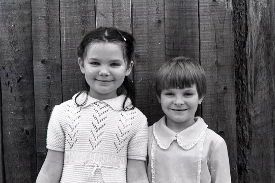 old scanned black and white photo from the family archive, child