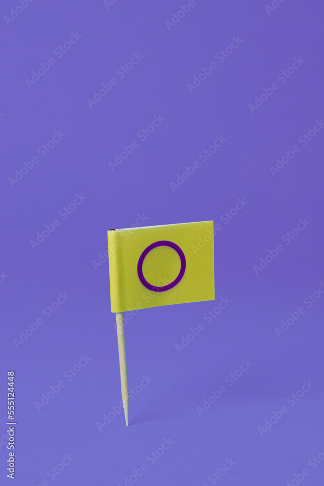 Poster an intersex flag on a purple background