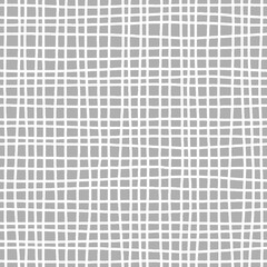 Uneven white mesh on dark grey background. Stylised hand drawn canvas texture. Monochrome seamless pattern for textile, wrapping paper, scrapbook, stationery and packaging design
