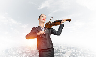 Young attractive business woman plays on skip