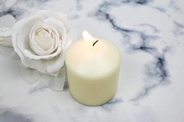 White candle white rose symbolic pure innocent peace, purity, comfort, relieve despair feeling,...