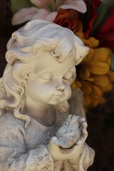 statue of an angel in the garden