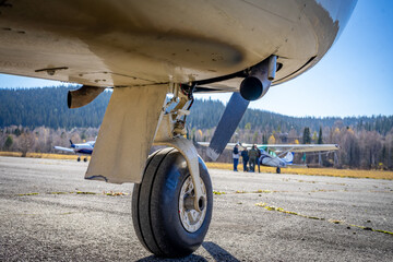 The front landing gear of a light propeller aircraft