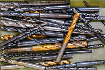 Close-up scene the group of used hole tools for CNC milling machine.