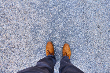 feet on asphalt 