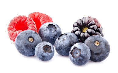 Blueberries with raspberries and blackberries on White Background. Ripe berries isolated.