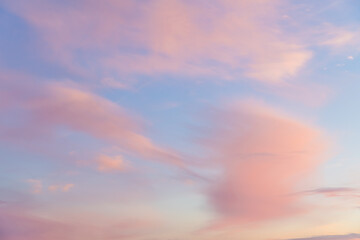 beautiful pink clouds at sunset, sunrise. pink, fabulous background with copy space