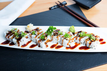 Eel Uramaki. Sushi rice combination with smoked eel fish.