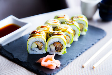Sushi roll with chicken and vegetables served in a Tokyo restaurant.