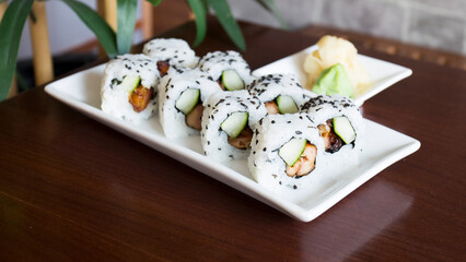 Sushi roll with chicken and vegetables served in a Tokyo restaurant. © Leckerstudio