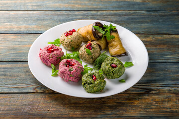 assorted pkhali Georgian cuisine on blue wooden table