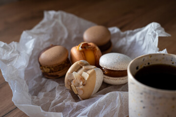 French dessert colored macarons on parchment. close-up