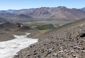 View of the breathtaking landscape at Paso Vergara / Paso del Planchón in Argentina while climbing up to the complex of the three volcanos Azufre, Peteroa and Planchón 