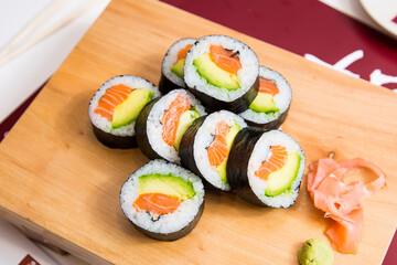 Salmon maki.
Image result for maki sushi
In Japanese, the word maki means "roll." Maki sushi is therefore a nori seaweed roll filled with rice and different ingredients.