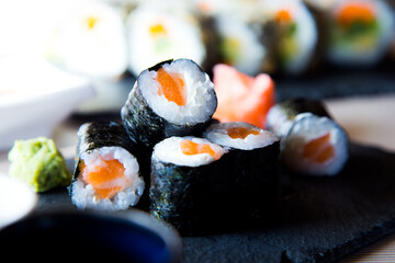 Salmon maki.
Image result for maki sushi
In Japanese, the word maki means "roll." Maki sushi is therefore a nori seaweed roll filled with rice and different ingredients.