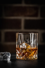 Whiskey with ice in glasses