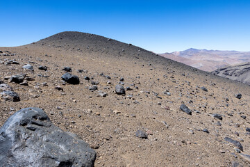 View of the breathtaking landscape at Paso Vergara / Paso del Planchón in Argentina while climbing up to the complex of the three volcanos Azufre, Peteroa and Planchón