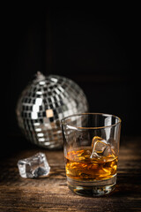 Whiskey with ice in glasses