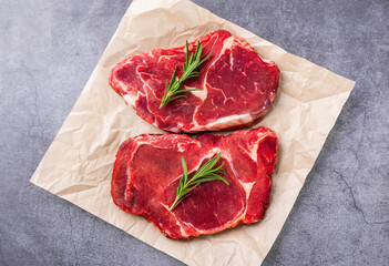 raw meat on wooden board