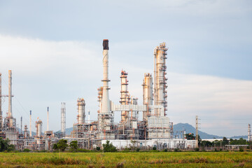 Obraz premium Oil gas refinery plant. May called petroleum, production or petrochemical plant. Industrial factory construction from engineering technology with steel pipe, pipeline, tank. Business for power energy.