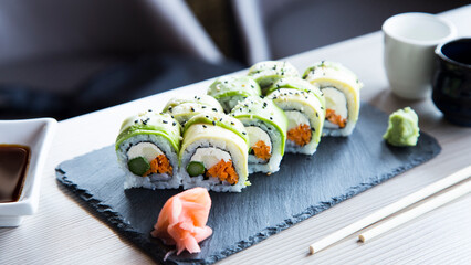 Vegan uramaki. Type of sushi covered with rice on the outside and filled with a combination of vegetables.