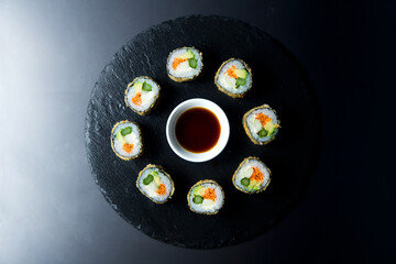 Vegan sushi hot roll. Sushi roll filled with vegetables and fried.