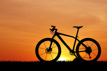 Obraz na płótnie Canvas bicycle on sunset