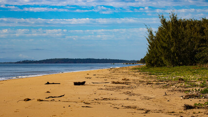 Beautiful day on Balgal Beach in Queensland, Australia. Idyllic tropical beach with yellow sand near Townsville. 