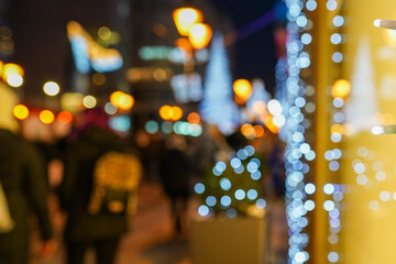 Christmas lights, Christmas decorations on the street. blurred background city street with...