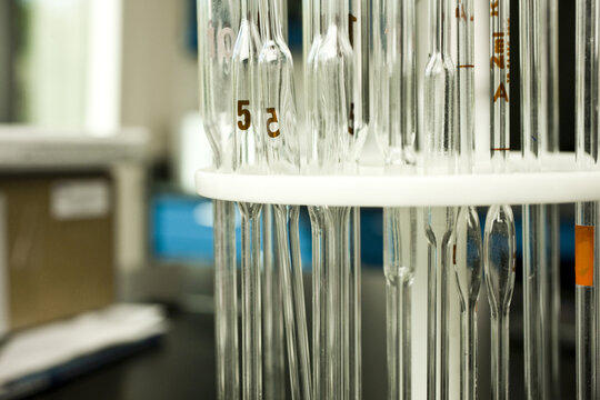 Glass beakers in laboratory, close-up