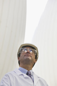 Scientist looking at a digester tank