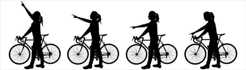 The cyclist is standing next to the bike. A girl with the bicycle holds the handlebars of the bicycle with her hand, with the other hand she shows the direction: up, down, sideways. Isolated on white