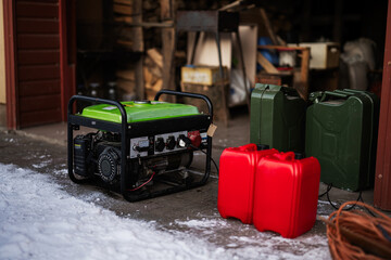 Gasoline portable generator with canisters. Mobile backup standby generator.